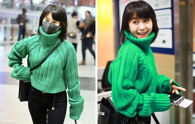 绿毛衣搭黑仔裤现身机场满屏都是腿，王子文真是太敢穿了！