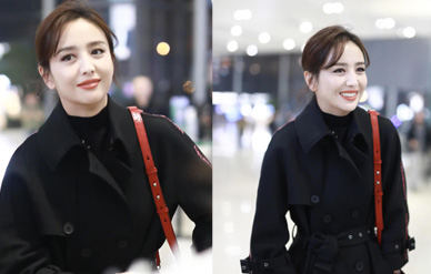 佟丽娅黑色束腰大衣优雅成熟 展甜笑露梨涡!